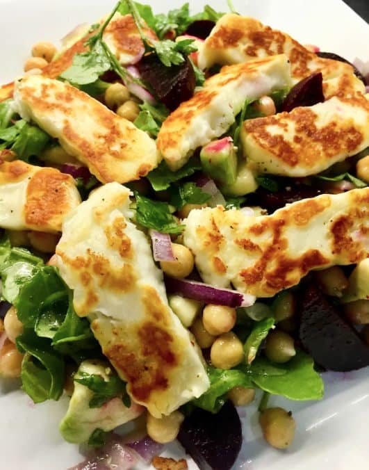 A bowl of halloumi Salad 