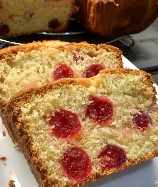 Cherry Madeira Cake , sliced on a plate