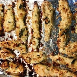 Baking tray with baked chicken strips