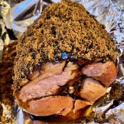 Easy Christmas Ham ready to roast in the tin with black treacle and brown sugar