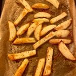 Healthy Oven Chips Slimming style baked golden brown on a baking sheet