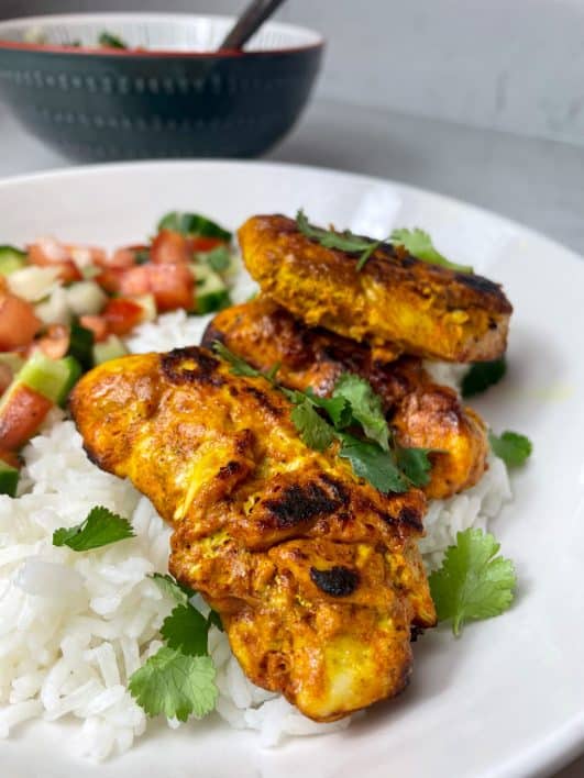 Tandoori Chicken, slimming style, served with rice & salad