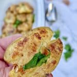 Crushed new potatoes close up baked and golden