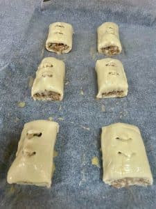 Easy Sausage Rolls, unbaked on baking tray