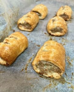 Easy Sausage Rolls - baked on baking paper