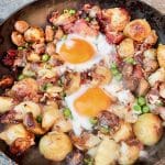 One pop fry up of new potatoes, egg, mushrooms, peas and bacon