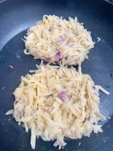 Potato rostis in a frying pan