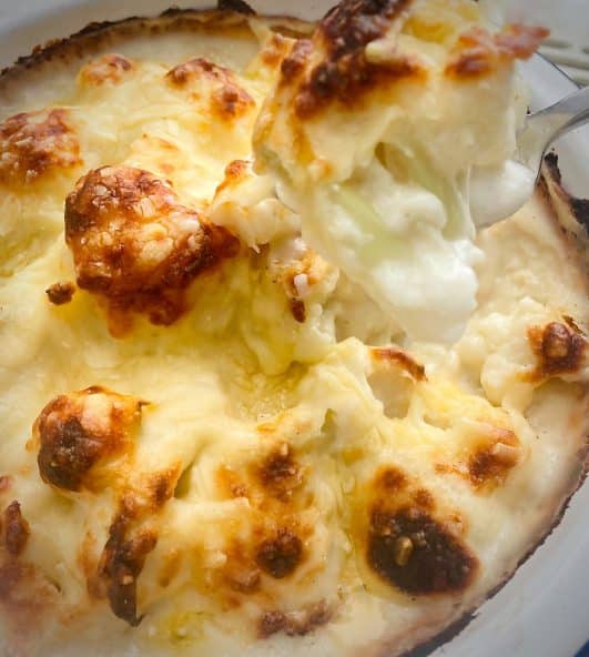 Bowl of fished cooked easy cauliflower cheese 