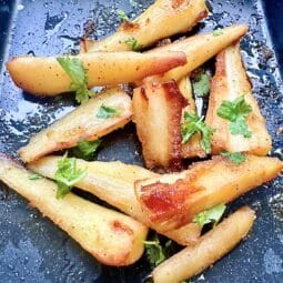A tray of honey Roast Parsnips
