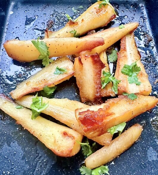 A tray of honey Roast Parsnips