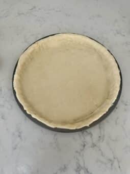 rolled out pastry for cornflake tart