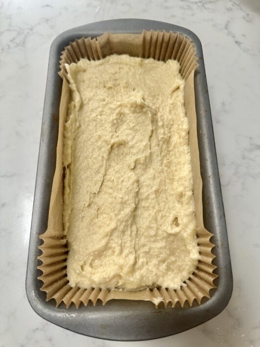 Coconut loaf cake batter in loaf tin 