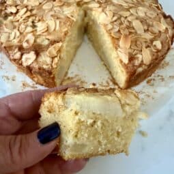 A baked one bowl pear & almond cake sliced
