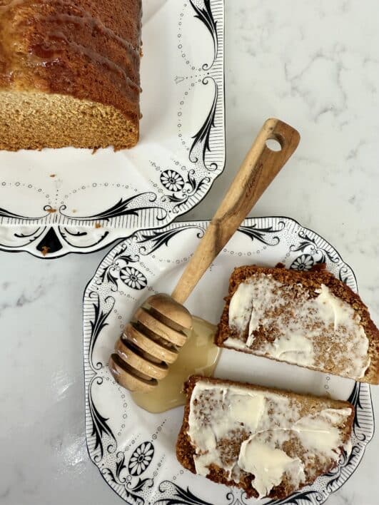 Easy Honey Loaf cake served sliced and buttered 
