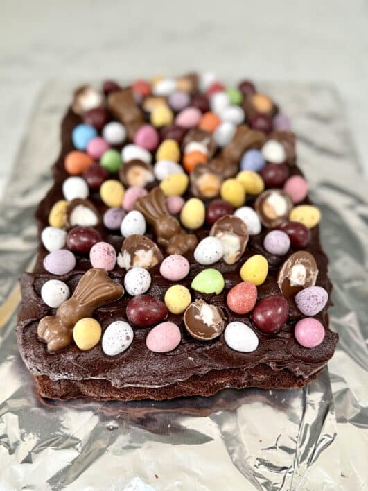 A delicious and easy chocolate sponge decorated with easter creams and butter cream 