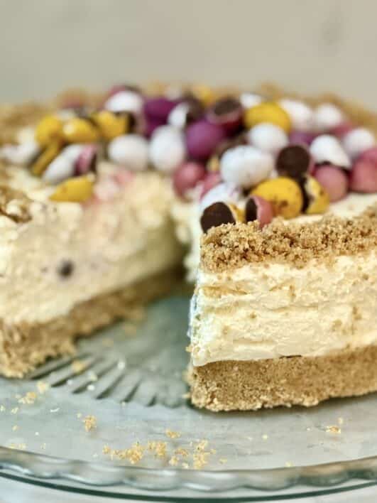 Mini egg cheesecake with a slice removed